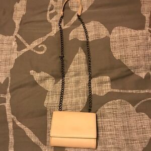 Baby pink clutch cross-body